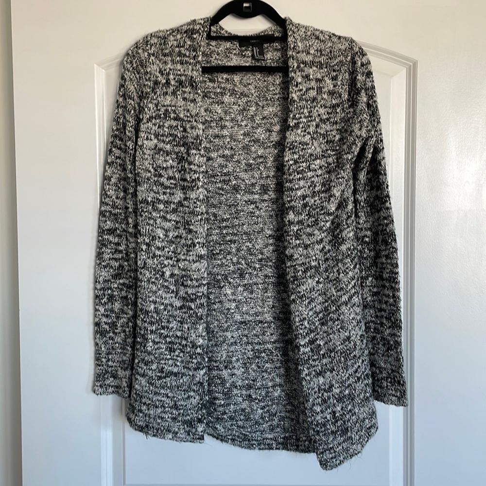 Mid length black and white cardigan, size small